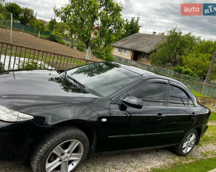 Черный Мазда 6, объемом двигателя 1.8 л и пробегом 210 тыс. км за 4500 $, фото 3 на Automoto.ua