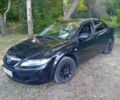 Чорний Мазда 6, об'ємом двигуна 1.8 л та пробігом 243 тис. км за 2238 $, фото 1 на Automoto.ua