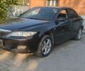 Чорний Мазда 6, об'ємом двигуна 1.8 л та пробігом 198 тис. км за 1900 $, фото 1 на Automoto.ua