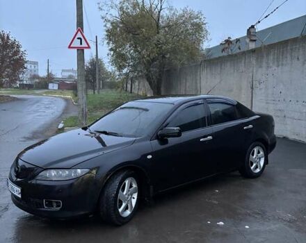 Черный Мазда 6, объемом двигателя 1.8 л и пробегом 301 тыс. км за 3800 $, фото 4 на Automoto.ua