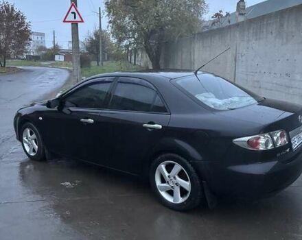 Черный Мазда 6, объемом двигателя 1.8 л и пробегом 301 тыс. км за 3800 $, фото 5 на Automoto.ua