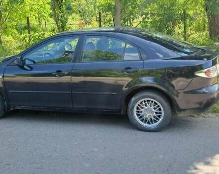 Чорний Мазда 6, об'ємом двигуна 2 л та пробігом 200 тис. км за 3300 $, фото 1 на Automoto.ua