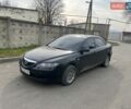 Черный Мазда 6, объемом двигателя 2 л и пробегом 200 тыс. км за 1750 $, фото 1 на Automoto.ua