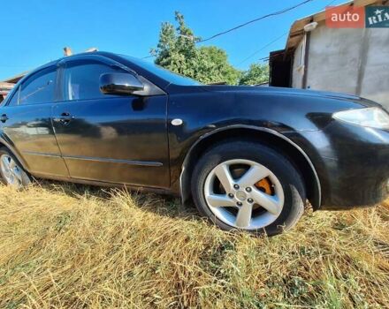 Черный Мазда 6, объемом двигателя 2 л и пробегом 218 тыс. км за 5000 $, фото 8 на Automoto.ua