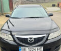 Черный Мазда 6, объемом двигателя 2 л и пробегом 243 тыс. км за 4700 $, фото 1 на Automoto.ua