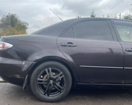 Чорний Мазда 6, об'ємом двигуна 2 л та пробігом 252 тис. км за 3800 $, фото 4 на Automoto.ua