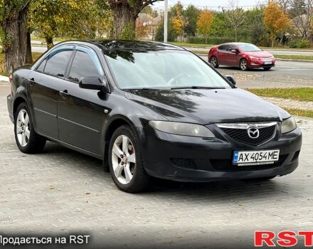 Черный Мазда 6, объемом двигателя 2.3 л и пробегом 250 тыс. км за 3300 $, фото 1 на Automoto.ua