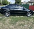 Чорний Мазда 6, об'ємом двигуна 2 л та пробігом 223 тис. км за 3712 $, фото 1 на Automoto.ua