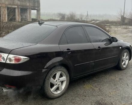 Черный Мазда 6, объемом двигателя 2 л и пробегом 185 тыс. км за 4100 $, фото 2 на Automoto.ua