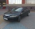 Чорний Мазда 6, об'ємом двигуна 1.8 л та пробігом 210 тис. км за 4500 $, фото 1 на Automoto.ua