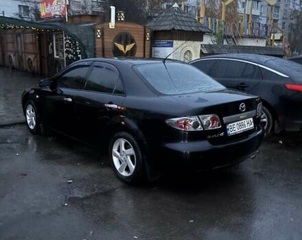 Черный Мазда 6, объемом двигателя 1.8 л и пробегом 301 тыс. км за 3800 $, фото 6 на Automoto.ua