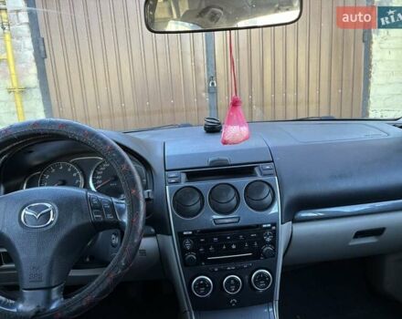 Черный Мазда 6, объемом двигателя 1.8 л и пробегом 301 тыс. км за 3800 $, фото 7 на Automoto.ua