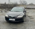 Чорний Мазда 6, об'ємом двигуна 2 л та пробігом 185 тис. км за 4111 $, фото 1 на Automoto.ua
