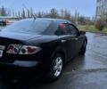 Черный Мазда 6, объемом двигателя 1.8 л и пробегом 301 тыс. км за 3800 $, фото 1 на Automoto.ua