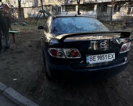 Черный Мазда 6, объемом двигателя 2.01 л и пробегом 196 тыс. км за 4500 $, фото 1 на Automoto.ua