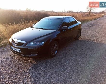 Черный Мазда 6, объемом двигателя 1.8 л и пробегом 200 тыс. км за 4700 $, фото 1 на Automoto.ua