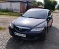 Черный Мазда 6, объемом двигателя 1.8 л и пробегом 329 тыс. км за 4500 $, фото 1 на Automoto.ua