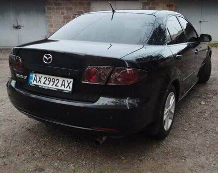 Черный Мазда 6, объемом двигателя 2 л и пробегом 185 тыс. км за 5000 $, фото 7 на Automoto.ua