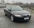 Черный Мазда 6, объемом двигателя 2 л и пробегом 185 тыс. км за 4100 $, фото 1 на Automoto.ua