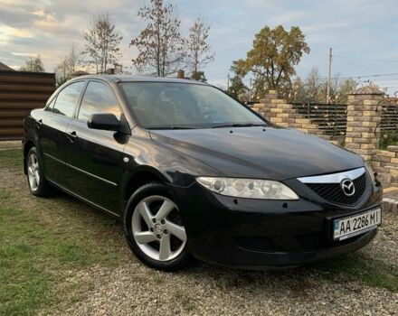 Черный Мазда 6, объемом двигателя 2 л и пробегом 202 тыс. км за 4700 $, фото 1 на Automoto.ua