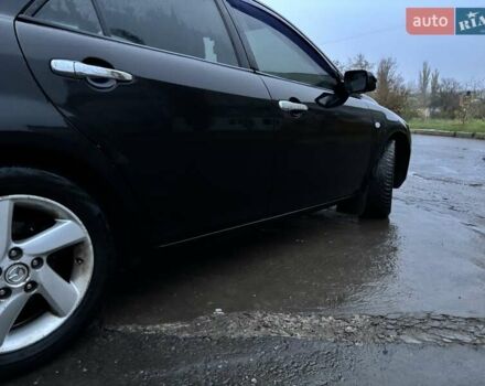 Черный Мазда 6, объемом двигателя 1.8 л и пробегом 301 тыс. км за 3800 $, фото 2 на Automoto.ua