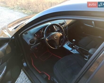 Черный Мазда 6, объемом двигателя 1.8 л и пробегом 200 тыс. км за 4700 $, фото 6 на Automoto.ua