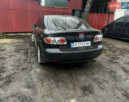 Черный Мазда 6, объемом двигателя 2 л и пробегом 300 тыс. км за 3000 $, фото 2 на Automoto.ua