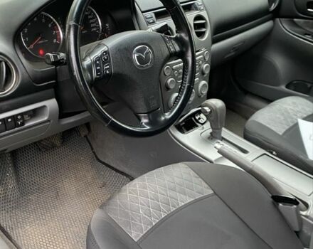 Черный Мазда 6, объемом двигателя 2 л и пробегом 257 тыс. км за 5500 $, фото 2 на Automoto.ua