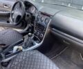 Черный Мазда 6, объемом двигателя 2 л и пробегом 300 тыс. км за 3800 $, фото 4 на Automoto.ua