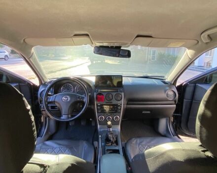 Черный Мазда 6, объемом двигателя 1.8 л и пробегом 235 тыс. км за 3700 $, фото 2 на Automoto.ua