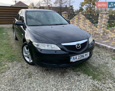 Черный Мазда 6, объемом двигателя 2 л и пробегом 202 тыс. км за 4700 $, фото 12 на Automoto.ua