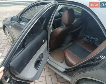 Чорний Мазда 6, об'ємом двигуна 1.8 л та пробігом 305 тис. км за 5000 $, фото 8 на Automoto.ua