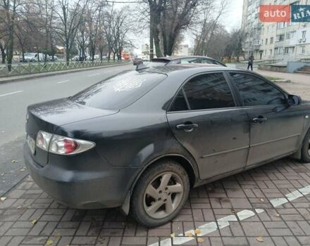 Чорний Мазда 6, об'ємом двигуна 1.8 л та пробігом 305 тис. км за 5000 $, фото 7 на Automoto.ua