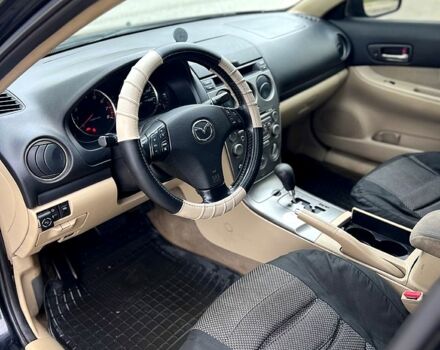 Черный Мазда 6, объемом двигателя 2.3 л и пробегом 250 тыс. км за 3300 $, фото 4 на Automoto.ua
