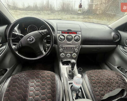 Чорний Мазда 6, об'ємом двигуна 2 л та пробігом 185 тис. км за 4111 $, фото 6 на Automoto.ua