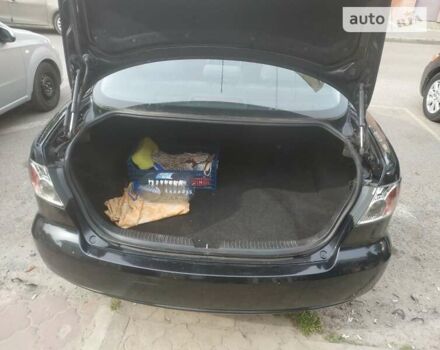 Черный Мазда 6, объемом двигателя 1.8 л и пробегом 250 тыс. км за 4200 $, фото 1 на Automoto.ua