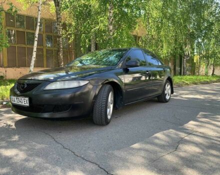 Черный Мазда 6, объемом двигателя 2 л и пробегом 399 тыс. км за 2700 $, фото 1 на Automoto.ua