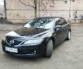 Черный Мазда 6, объемом двигателя 2 л и пробегом 185 тыс. км за 5000 $, фото 1 на Automoto.ua
