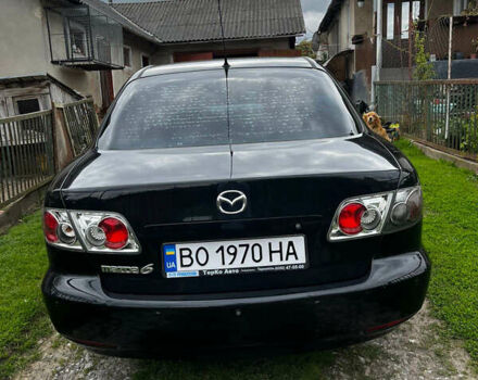 Черный Мазда 6, объемом двигателя 1.8 л и пробегом 210 тыс. км за 4500 $, фото 1 на Automoto.ua