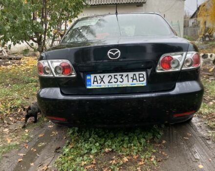Черный Мазда 6, объемом двигателя 2 л и пробегом 257 тыс. км за 5500 $, фото 1 на Automoto.ua