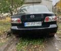 Черный Мазда 6, объемом двигателя 2 л и пробегом 257 тыс. км за 5500 $, фото 1 на Automoto.ua