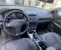 Черный Мазда 6, объемом двигателя 2 л и пробегом 300 тыс. км за 3800 $, фото 12 на Automoto.ua