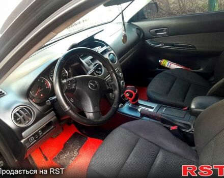 Черный Мазда 6, объемом двигателя 2 л и пробегом 250 тыс. км за 4200 $, фото 2 на Automoto.ua