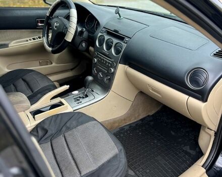 Черный Мазда 6, объемом двигателя 2.3 л и пробегом 250 тыс. км за 3300 $, фото 5 на Automoto.ua