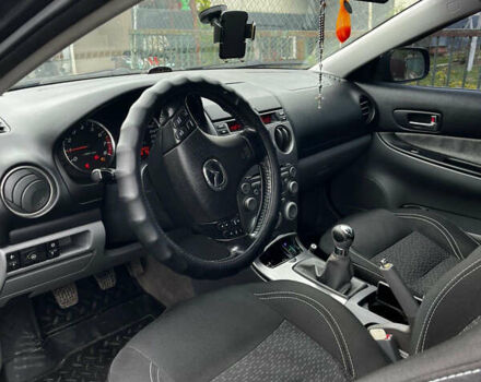 Черный Мазда 6, объемом двигателя 1.8 л и пробегом 210 тыс. км за 4500 $, фото 6 на Automoto.ua