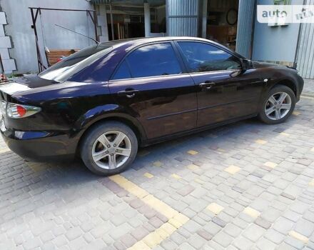 Чорний Мазда 6, об'ємом двигуна 1.8 л та пробігом 211 тис. км за 5200 $, фото 1 на Automoto.ua