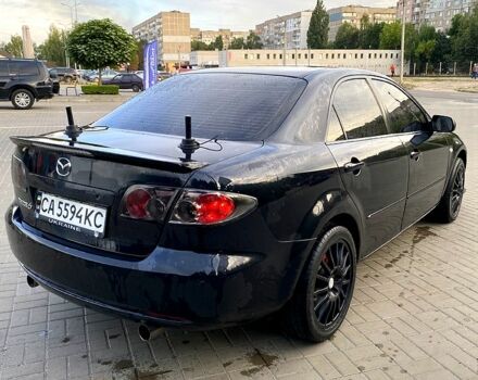 Черный Мазда 6, объемом двигателя 2 л и пробегом 320 тыс. км за 5350 $, фото 1 на Automoto.ua