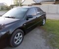 Черный Мазда 6, объемом двигателя 2 л и пробегом 205 тыс. км за 4399 $, фото 1 на Automoto.ua