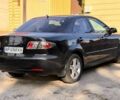 Черный Мазда 6, объемом двигателя 2 л и пробегом 350 тыс. км за 4350 $, фото 3 на Automoto.ua