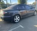 Черный Мазда 6, объемом двигателя 2 л и пробегом 180 тыс. км за 3300 $, фото 3 на Automoto.ua